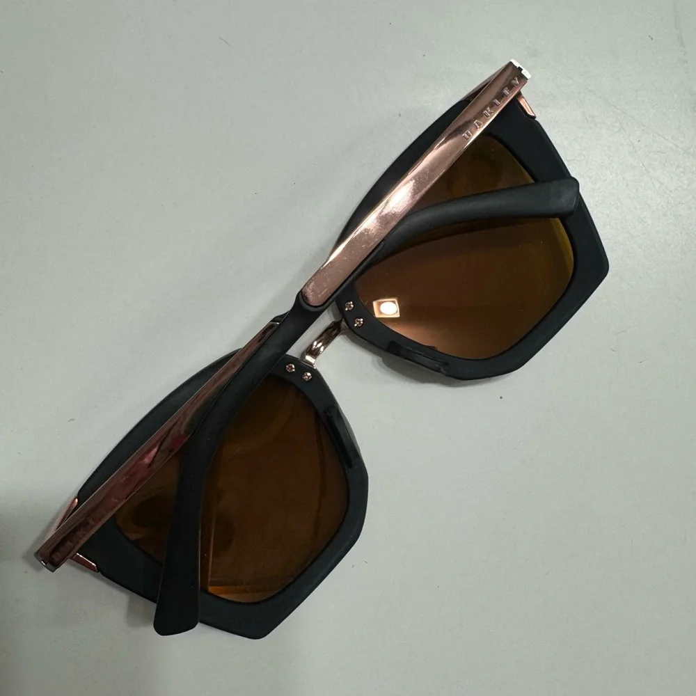 Oakley Side Swept Sunglasses — Black Frame with Rose Gold Mirrors